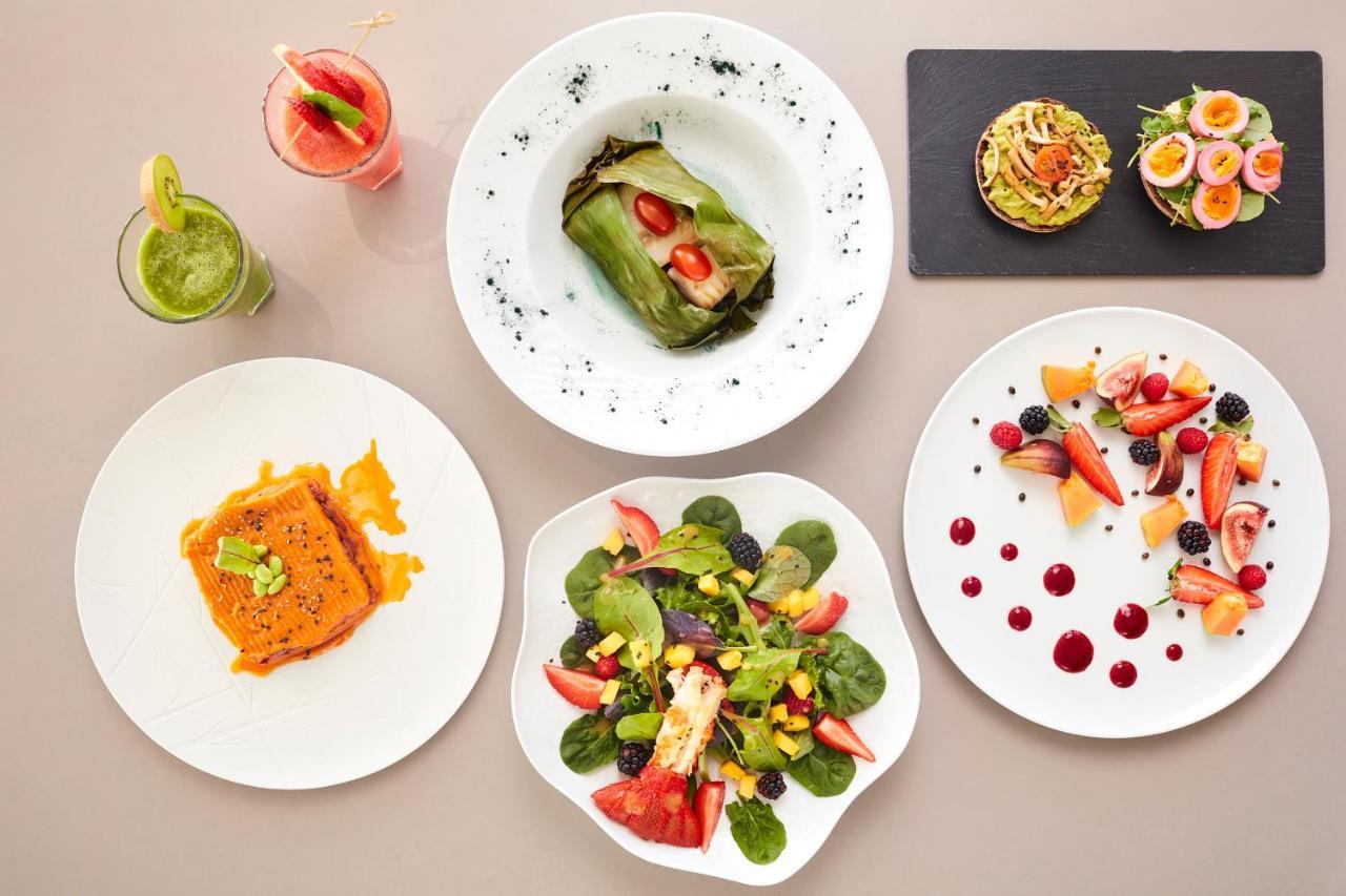 Longevity Health & Wellness Hotel - Adults Only Alvor Exterior photo A selection of dishes from the restaurant