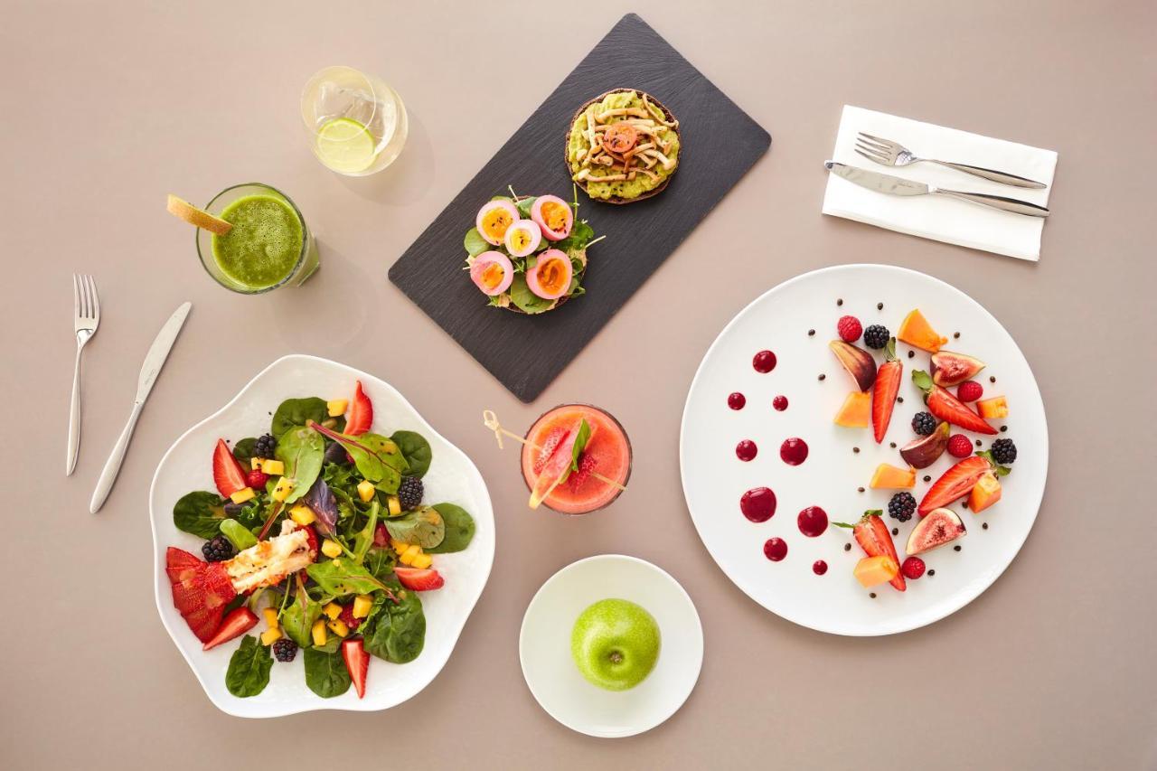 Longevity Health & Wellness Hotel - Adults Only Alvor Exterior photo A selection of dishes from the menu of the restaurant