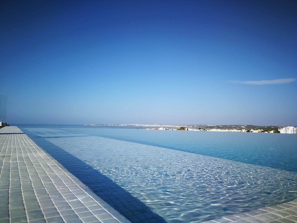Longevity Health & Wellness Hotel - Adults Only Alvor Exterior photo Infinity pool at the Hotel